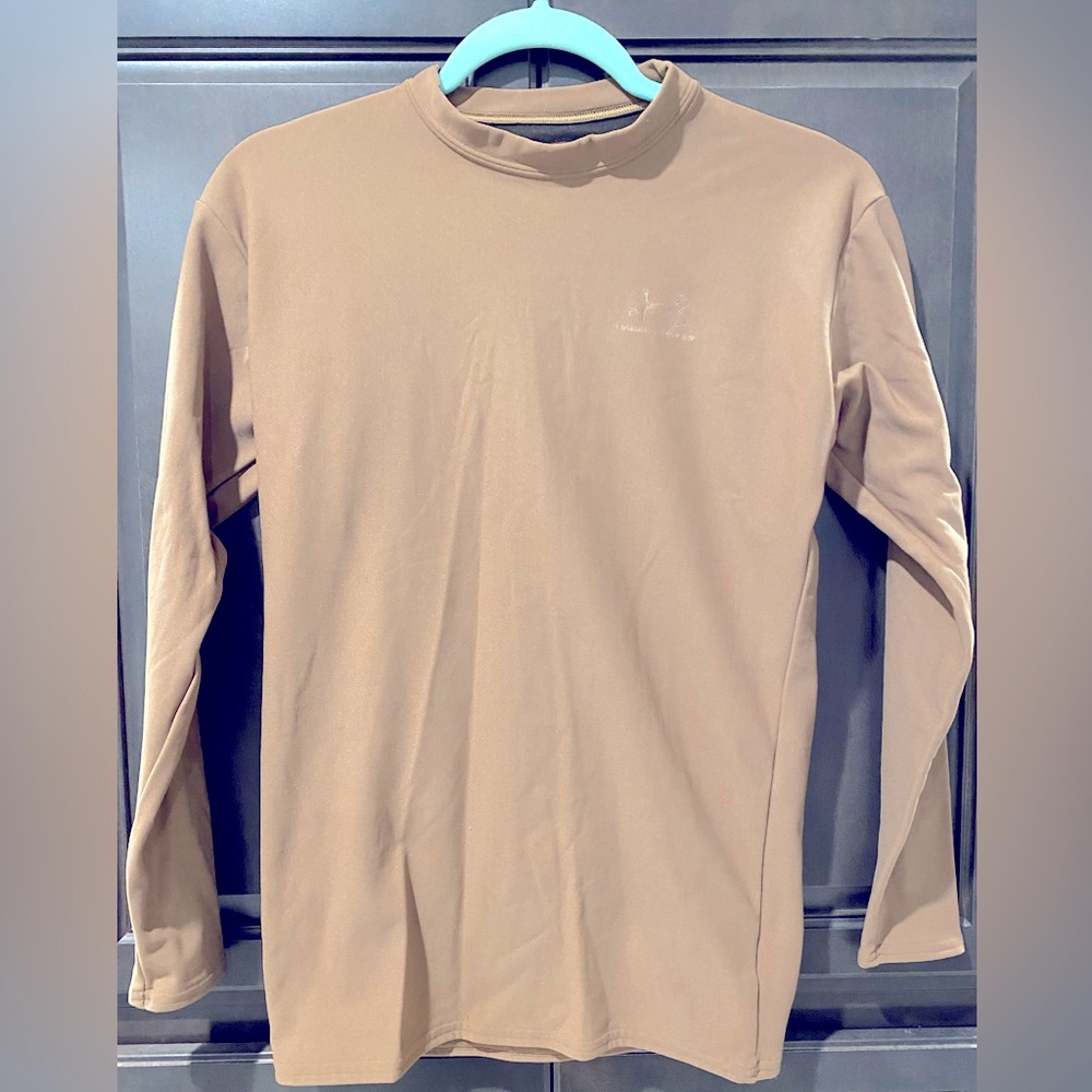 Under Armor cold weather compression long sleeve shirt.  Size L.  Fits like a M.